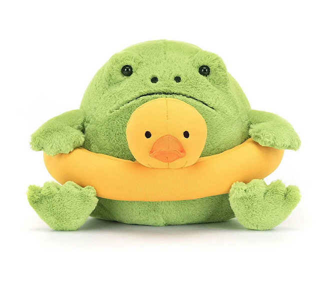 Squat green plush frowning frog wearing a yellow floaty ring with a rubber ducky head.