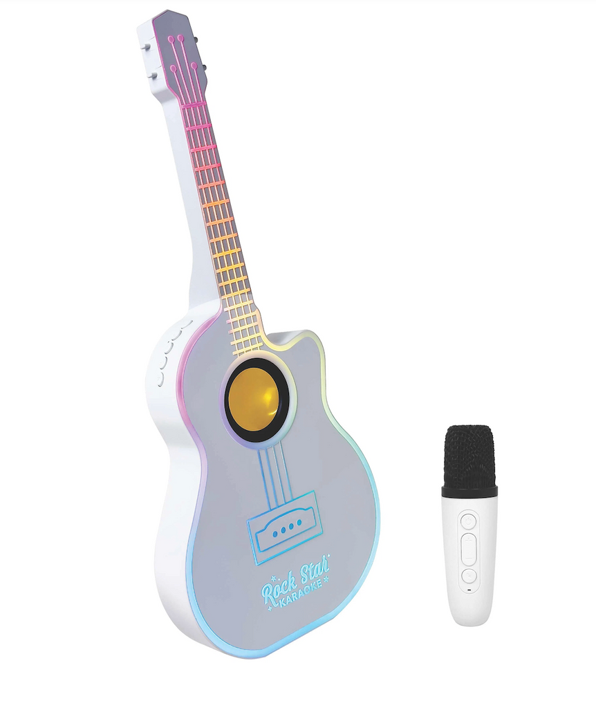White guitar-shaped karaoke system  with colorful LED-style rainbow lighting along the neck and body, shown alongside the white wireless microphone. 