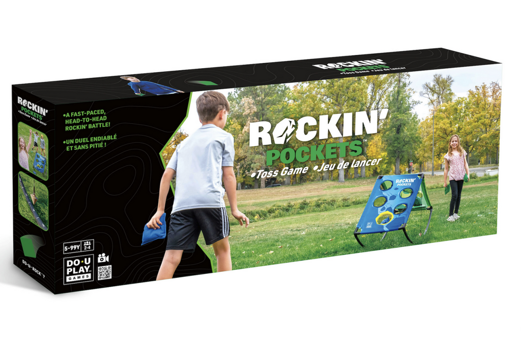 Rectangle shaped box with a color picture of a couple of kids playing Rockin' Pockets Toss game outside. The target is on a raised frame that rocks back and forth as the bean bags are thrown towards it. 