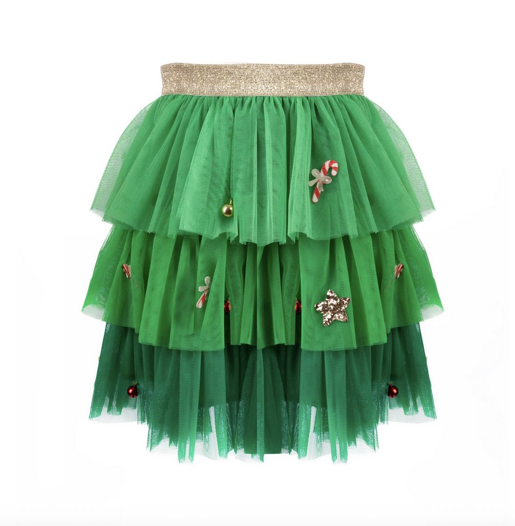 A festive green tutu with three layers of soft, tulle that creates a beautiful ombré effect, with light green at the top and deepening to a rich, dark, green at the bottom. There are festive holiday charms including tiny ornaments, candy canes and stars decorating the tutu all over. 