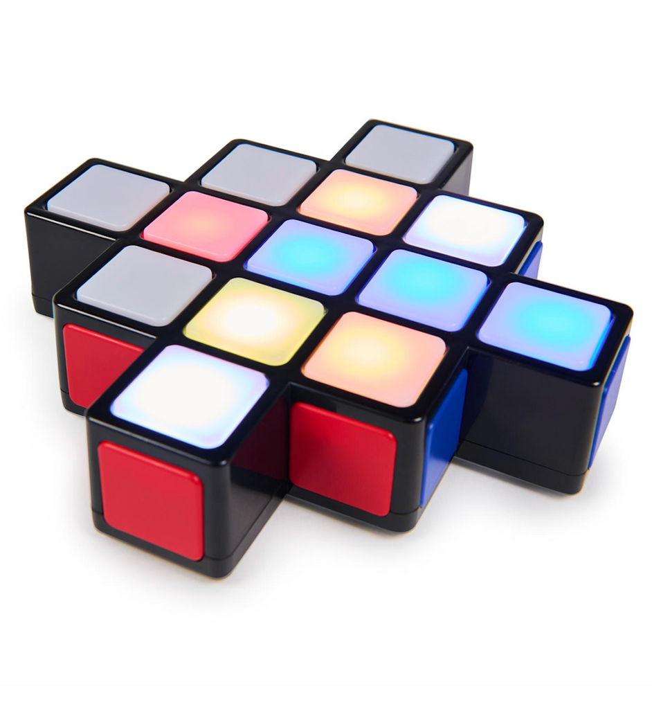 Rubik's Rush game lying flat on a table and lit up in the middle of a game. 