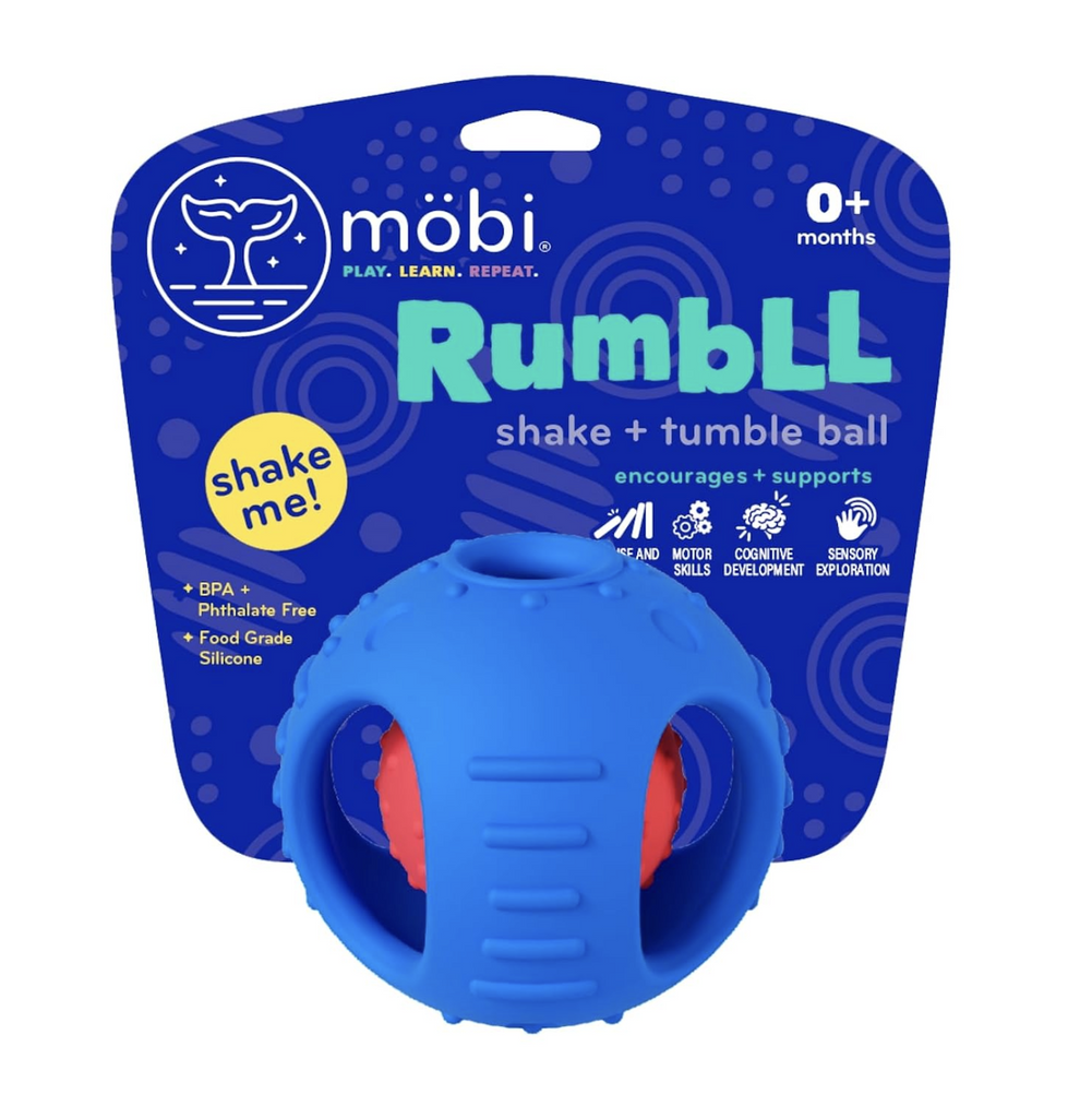Blue and red Rumbll the shake and tumble ball. The outer ball is blue with openings that make it easy for baby to grasp and inside is a smaller red ball that rattles. attached to a blue hang card that reads mobi Rumbll shake & tumble ball. 