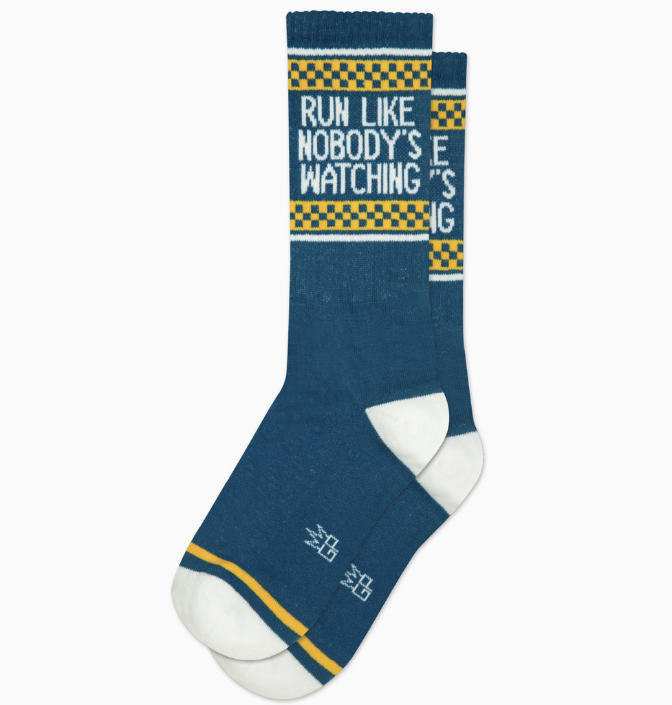 Blue tube socks with white stripes and yellow and blue checkerboard that read "Run Like Nobody's Watching" in white letters. 