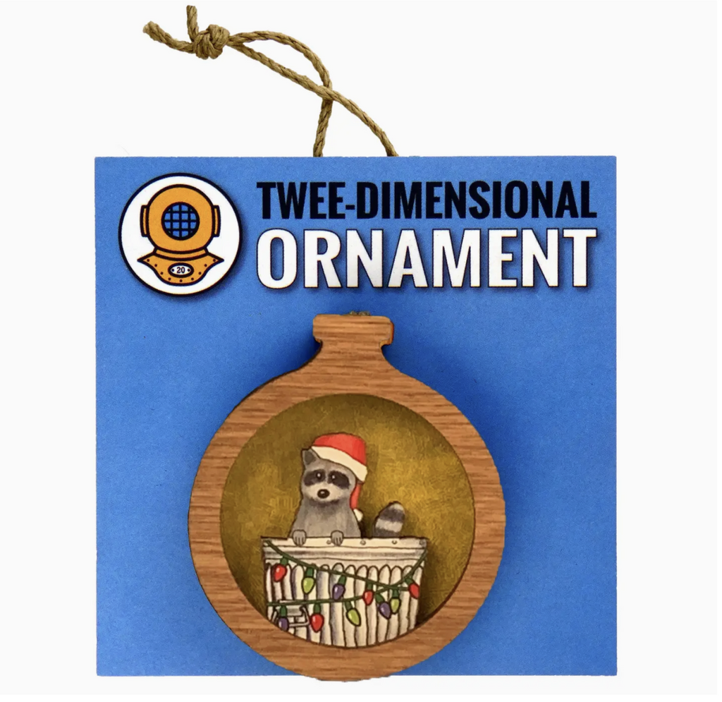 Santa raccoon wooden ornament on a blue background