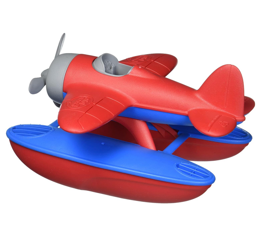 Red and blue toy seaplane with gray propeller. 