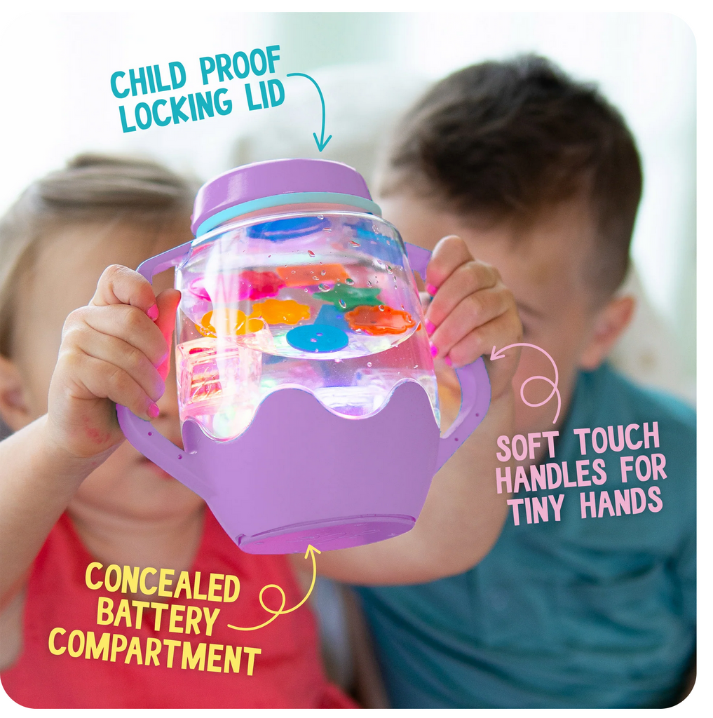 Two children holding the sensory play jar with text that reads: Child proof locking lid, soft touch handles for tiny hands, concealed battery compartment.