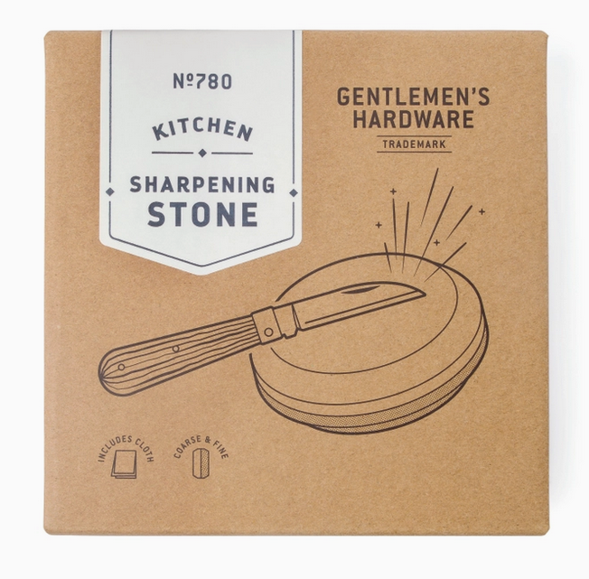 Box with illustration of a knife resting on a sharpening stone and label that reads No 780 Kitchen Sahrpeneing Stone.