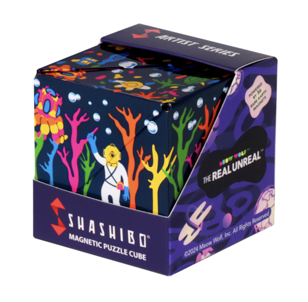 Shashibo with Glowquarium Grapeview design packaged in it's box with an open side. 