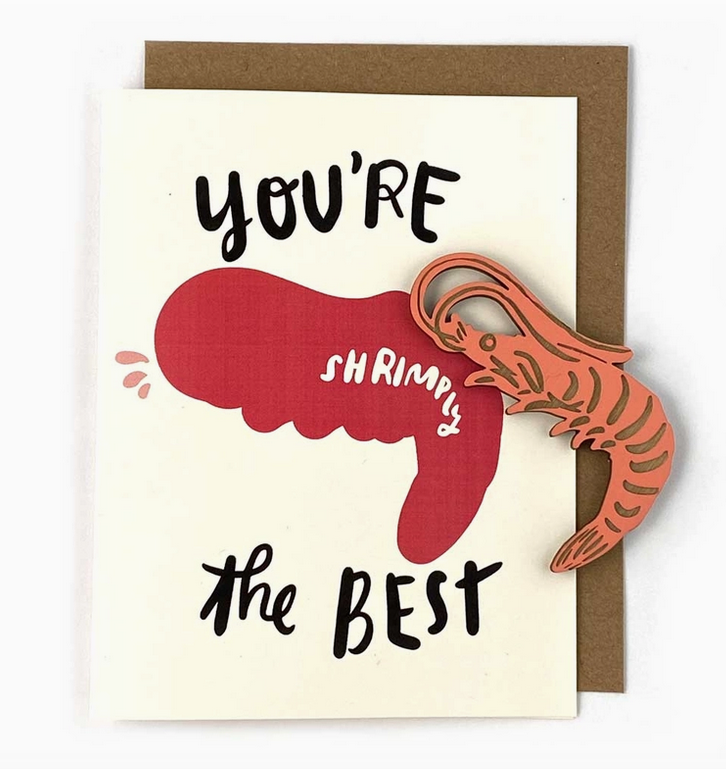 Greeting card that reads "You're The Best" written in black lettering with a removeable wooden shrimp magnet.
