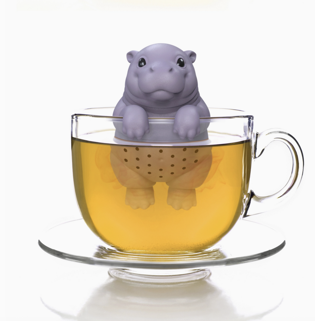Hippo shaped silicone tea strainer in glass of tea