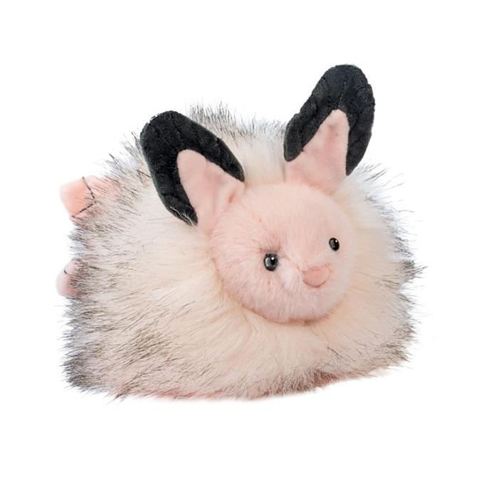 Bunny stuffed animal with very fluffy white fur that is tipped with black, pink and black ears as well a cute little bunny face. 