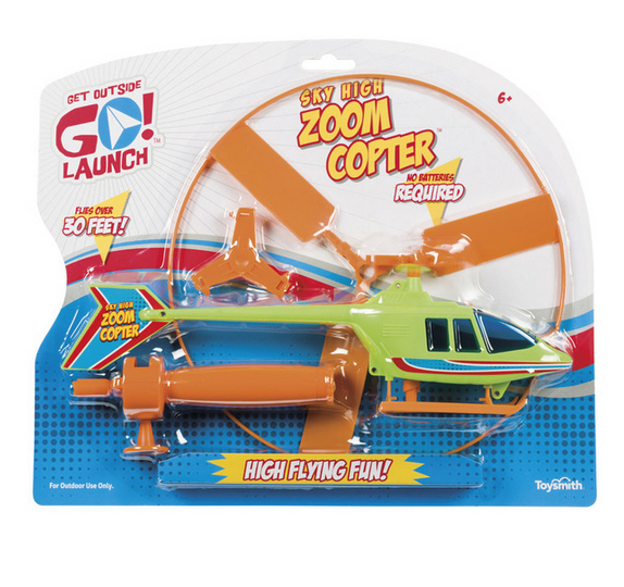 The Sky High Zoom Copter packaged in clear plastic on a white, red and blue backing card. Each piece of the helicopter is visible. 