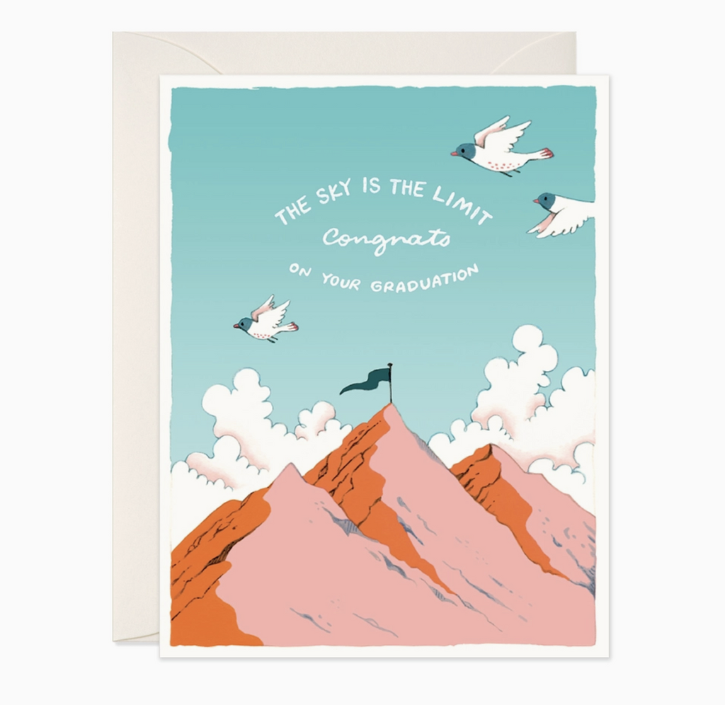 Illustrated greeting card featuring a mountain top with a flag and birds flying through the clouds that reads "The Sky Is The Limit Congrats On Your Graduation" 