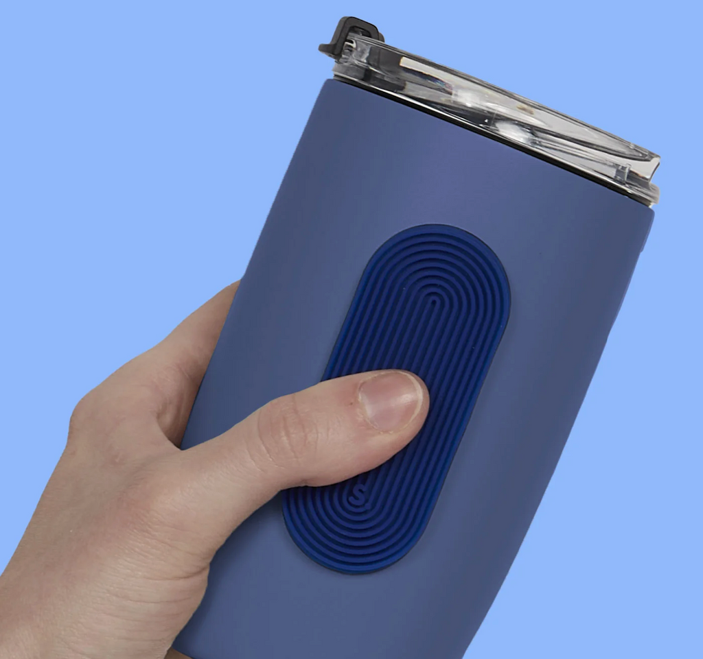 The Slabs Sensory Sticker Groove Oval attached to stainless travel cup. 