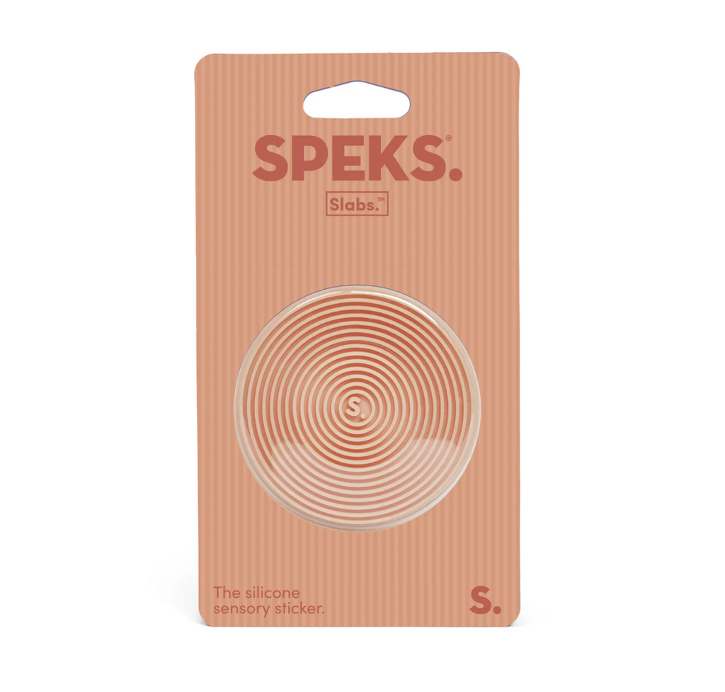 Speks Slabs Groove Round sensory sticker in a light peach color with a circular groove texture. 