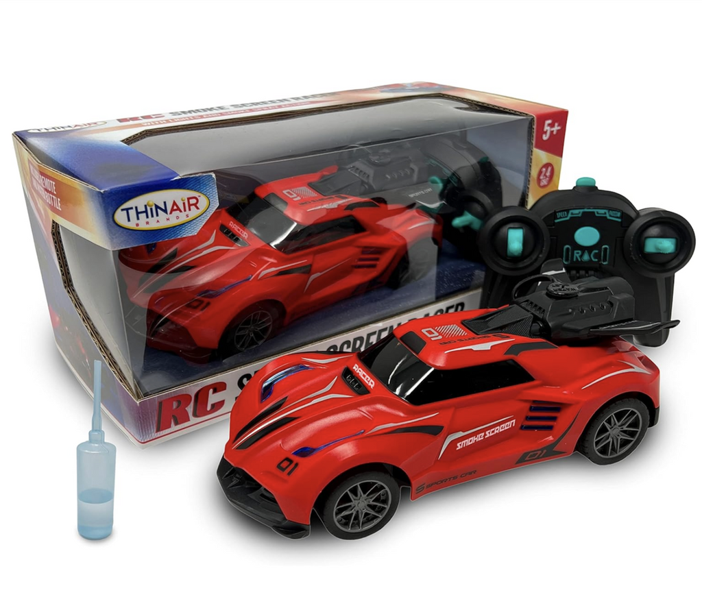 The Smoke Screen Racer Remote Control Red race car with white and black racing stripe. The car is set in front of it's box with black remote control and water bottle to fill up the fog feature. 