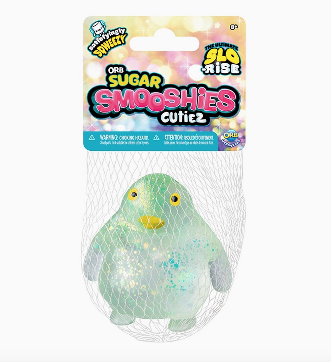 Penguin Sugar Smooshies Cutiez with green and gold glitter in a net bag.