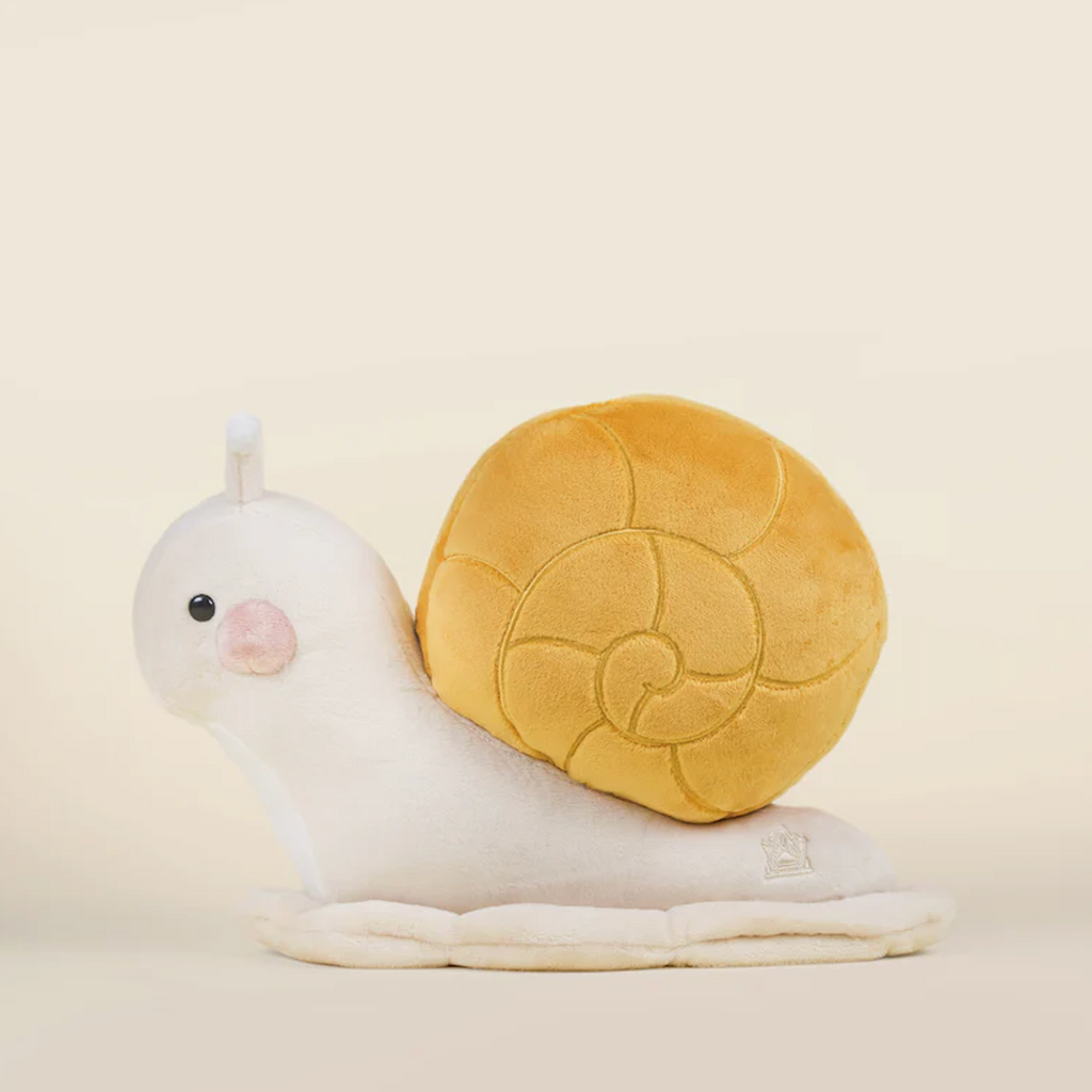 Snaili the Snail plush toy from Bellzi, pictured from the side. 