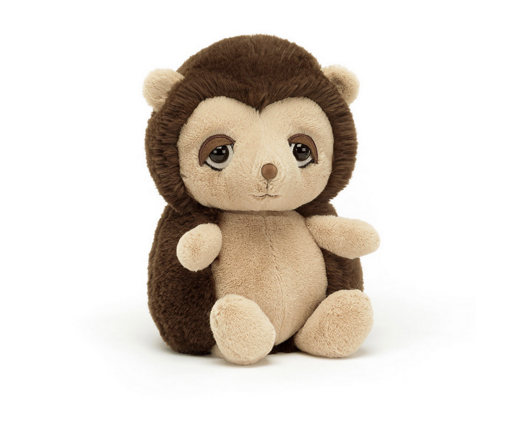 Snoozling Hedgehog is a tan and dark brown plush hedgehog with big sleepy eyes.