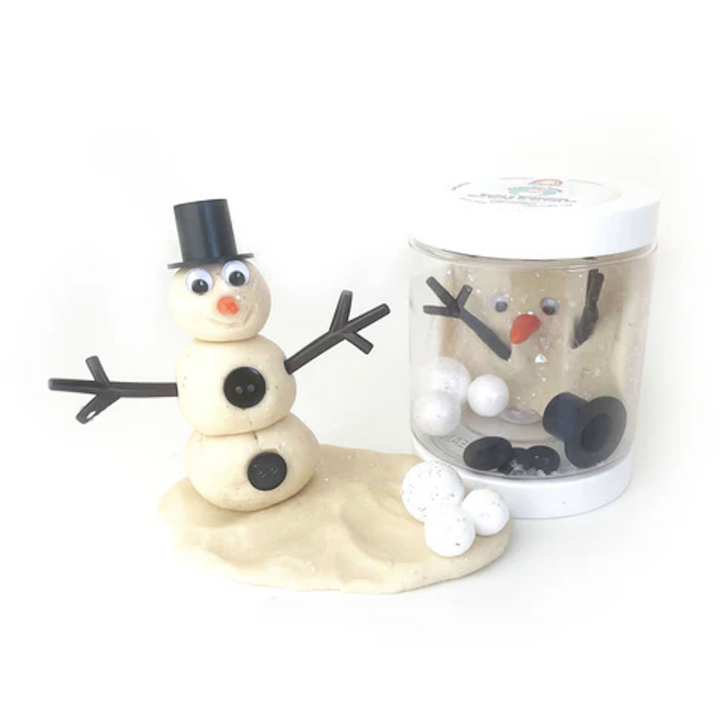 The Mini Dough to Go Snowman set with marshmallow modeling dough and accessories to make the perfect snowman. 