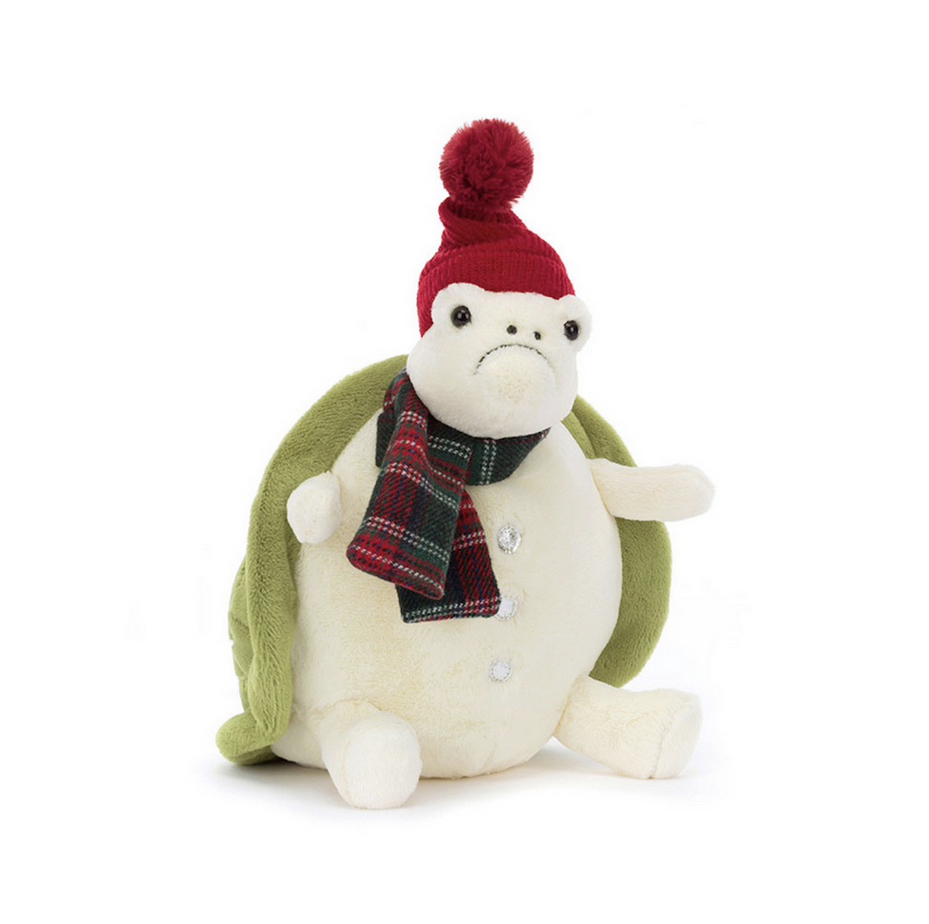 Timmy Turtle all decked as a snowman wearing a red and green plaid scarf, red beanie hat and sparkly buttons down his front. 