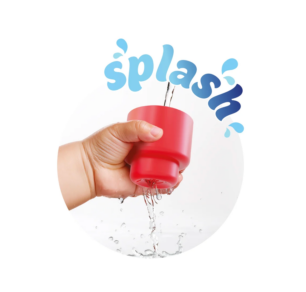 A baby hand squeezing water out of a red soft block with the word "splash" on a white background.