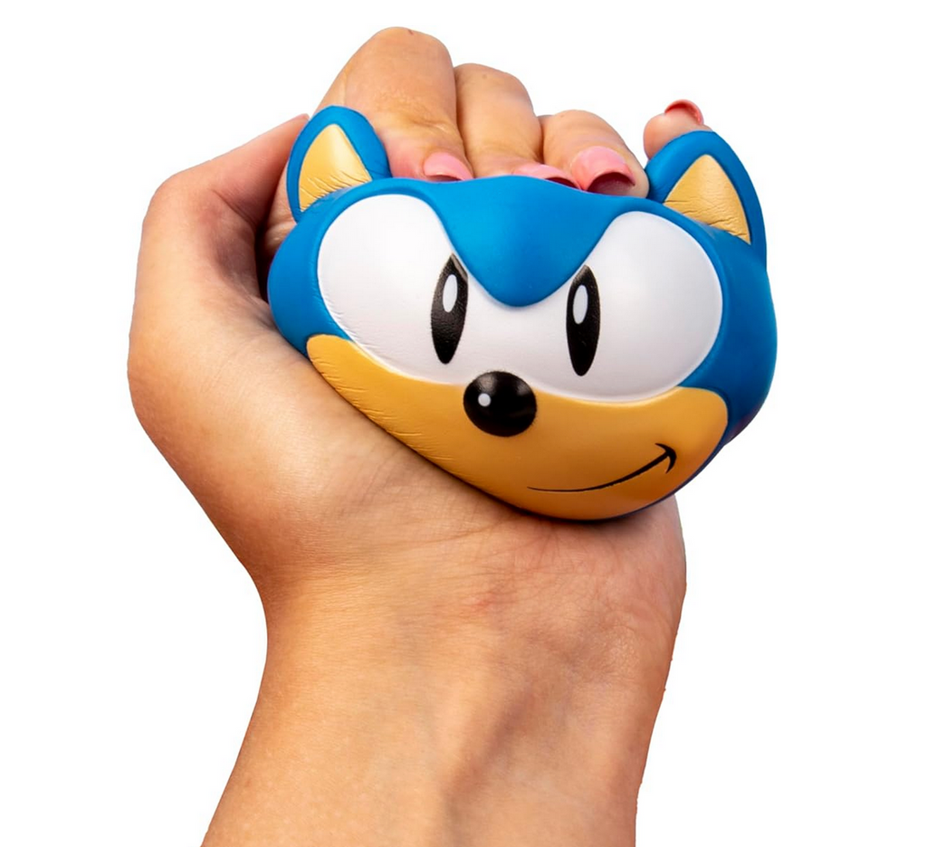 Stress ball being squeezed that looks like Sonic the Hedgehog. 