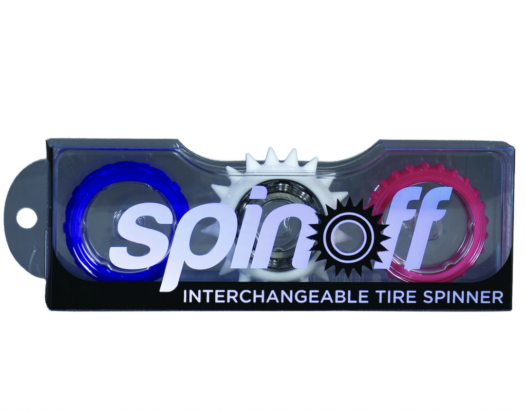 Spin Off Interchangeable Tire Spinner packaged in a clear box that shows all three interchangeable tire wraps. 