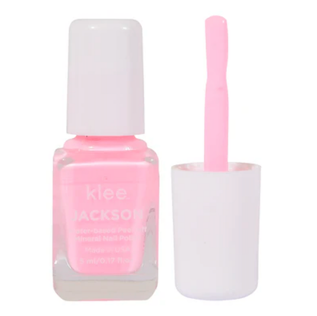 Pink nail polish bottle with a white cap and pink brush included in the Spinning Pink Makeup Kit. 