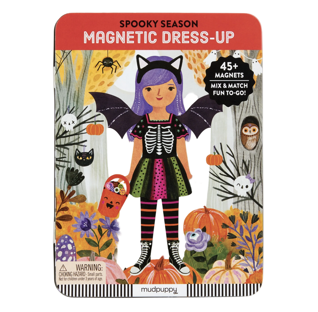 Spooky Season magnetic dress-up tin with an illustration of a girl with purple hair trick or treating.