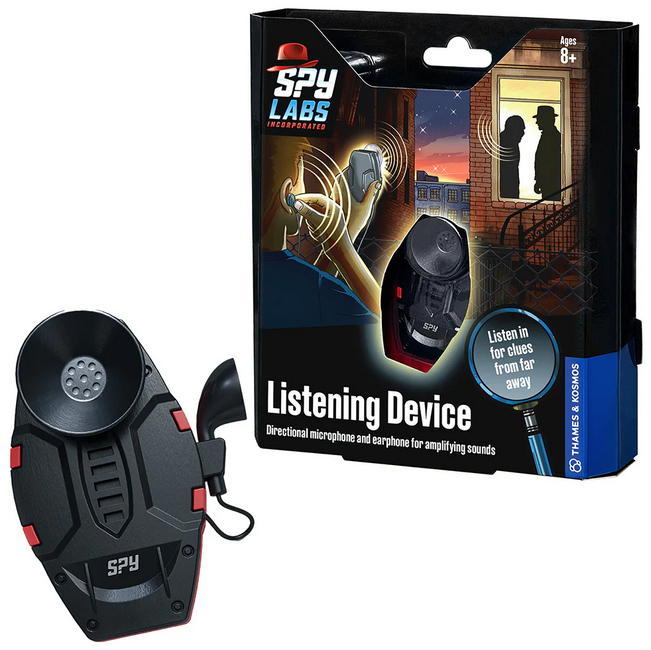 Spy Labs Listening Device outside of the box it comes packaged in that has an illustrated scene of a young detective listening in on a conversation being held inside a house.
