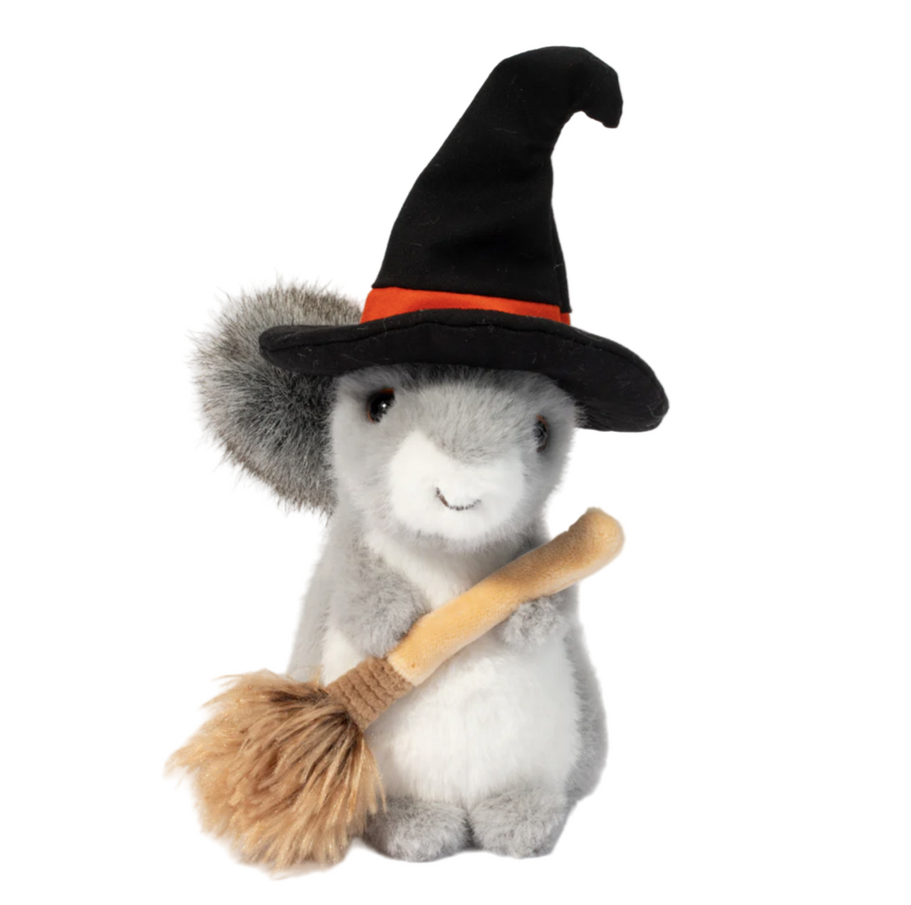 Plush squirrel holding a broom and wearing a witch hat on a white background.