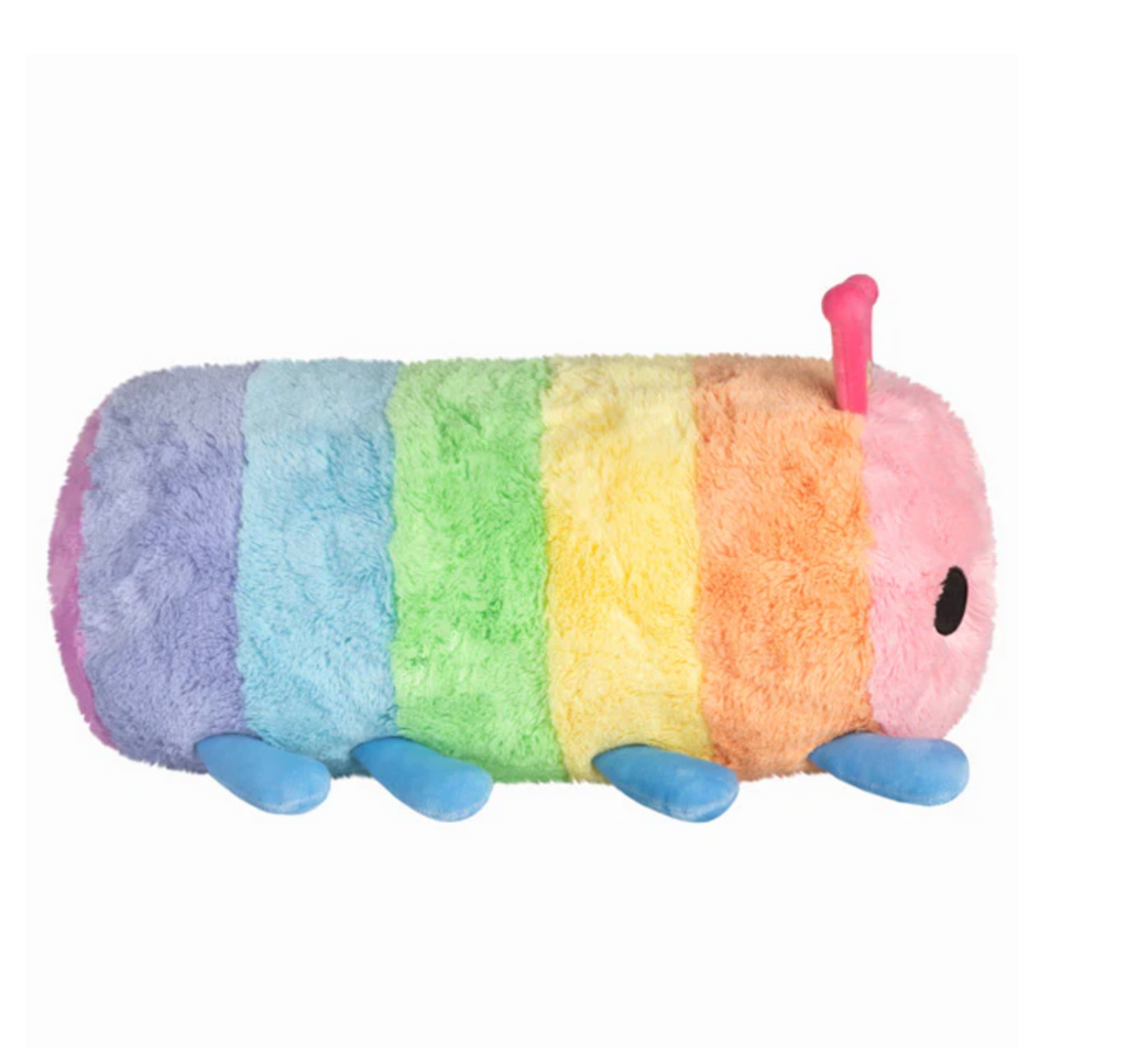 Side view of the Squishable Rainbow Caterpillar showing off it's rainbow stripes. 
