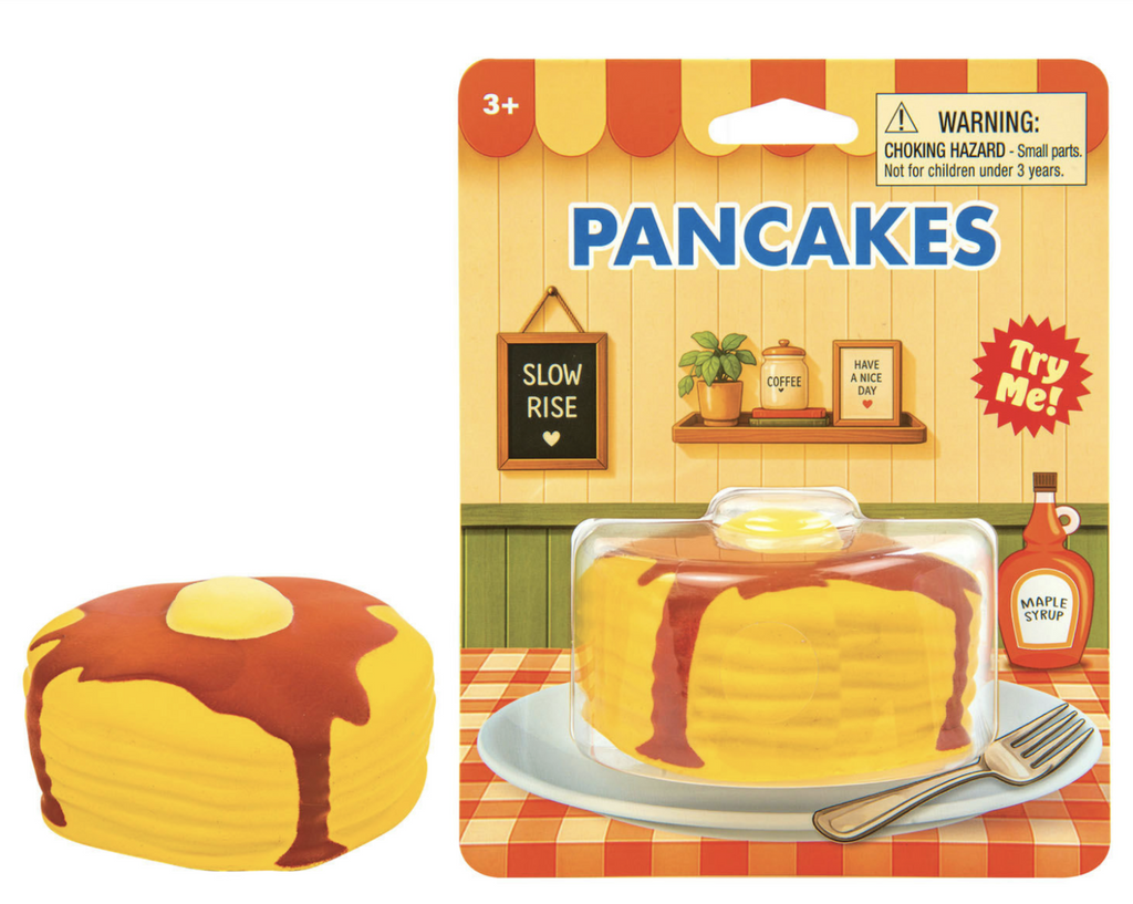 Squishy Slow Rise Pancakes, a sensory toy  shaped like a stack of pancake with a generous pat of butter and drizzle of syrup on the top. 