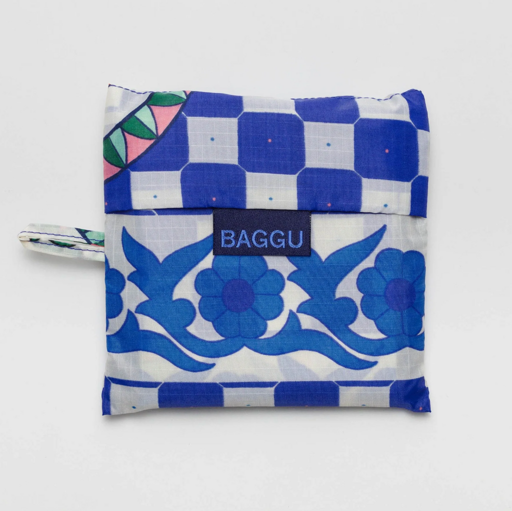 Cherry Tile Baggu bag folded inside it's matching pouch.