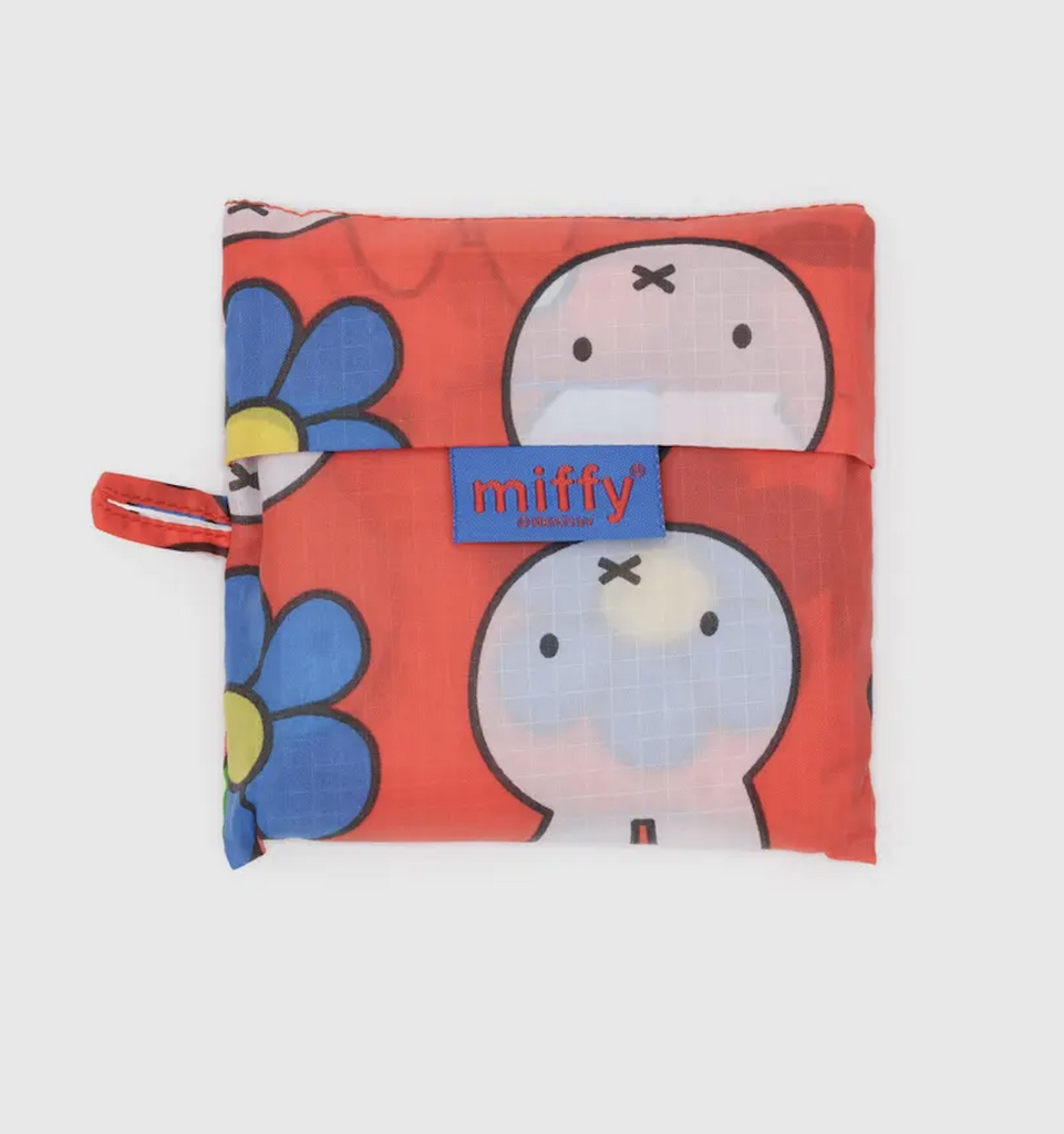 4 x 4 pouch printed with the Flower Miffy design that holds the Standard baggu reuseable shopping bag. 