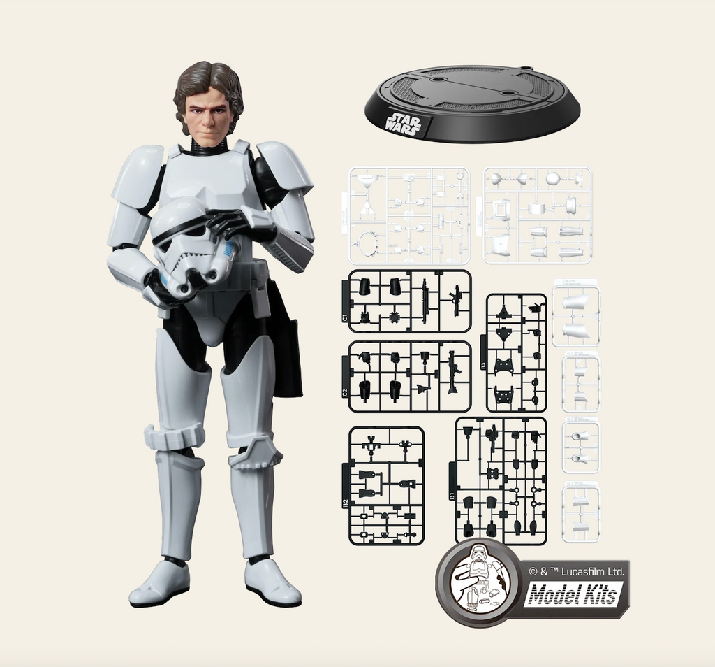 Han Solo disguised as a stormtrooper model kit with the pieces in the frames, the display stand as well as the completed model. 