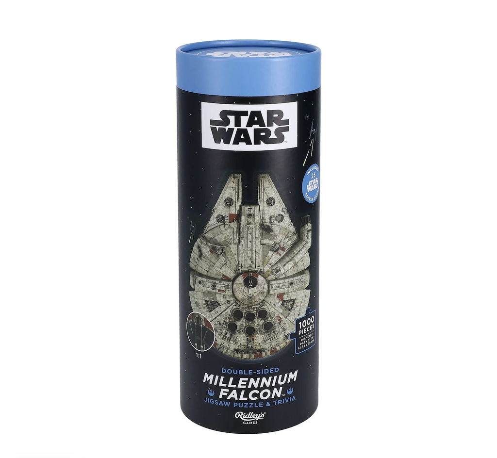 A black tube with a blue lid that has a picture of the Millennium Falcon star ship from Star Wars that holds the 1000 puzzle pieces inside. 
