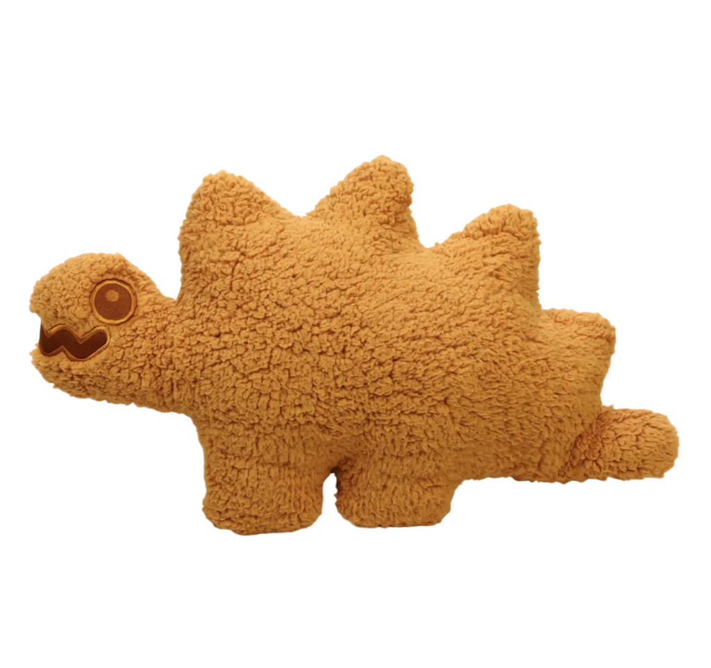 Stego Sammy shaped plush pillow made to look like every kids favorite dino nuggets. Sammy is a soft, huggable pillow with brown fur. 