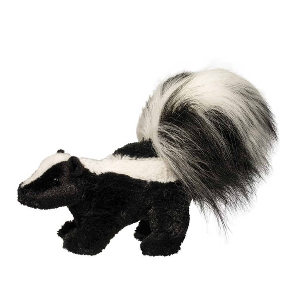 Skunk stuffed animal standing up and facing the left. His tail is super fluffy. 