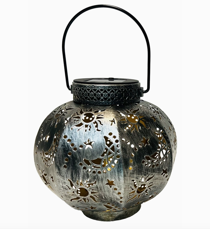 Sun and Moon Solar Garden light has a brushed metal finsh, handle for hanging and cut outs of suns and moons. 