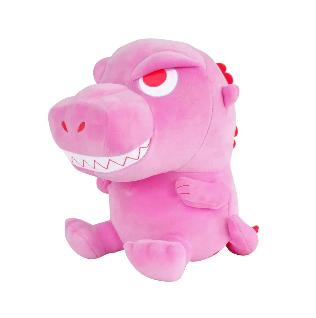 The '89 Godzilla plush in pink with red eyes and red scales down his back. 