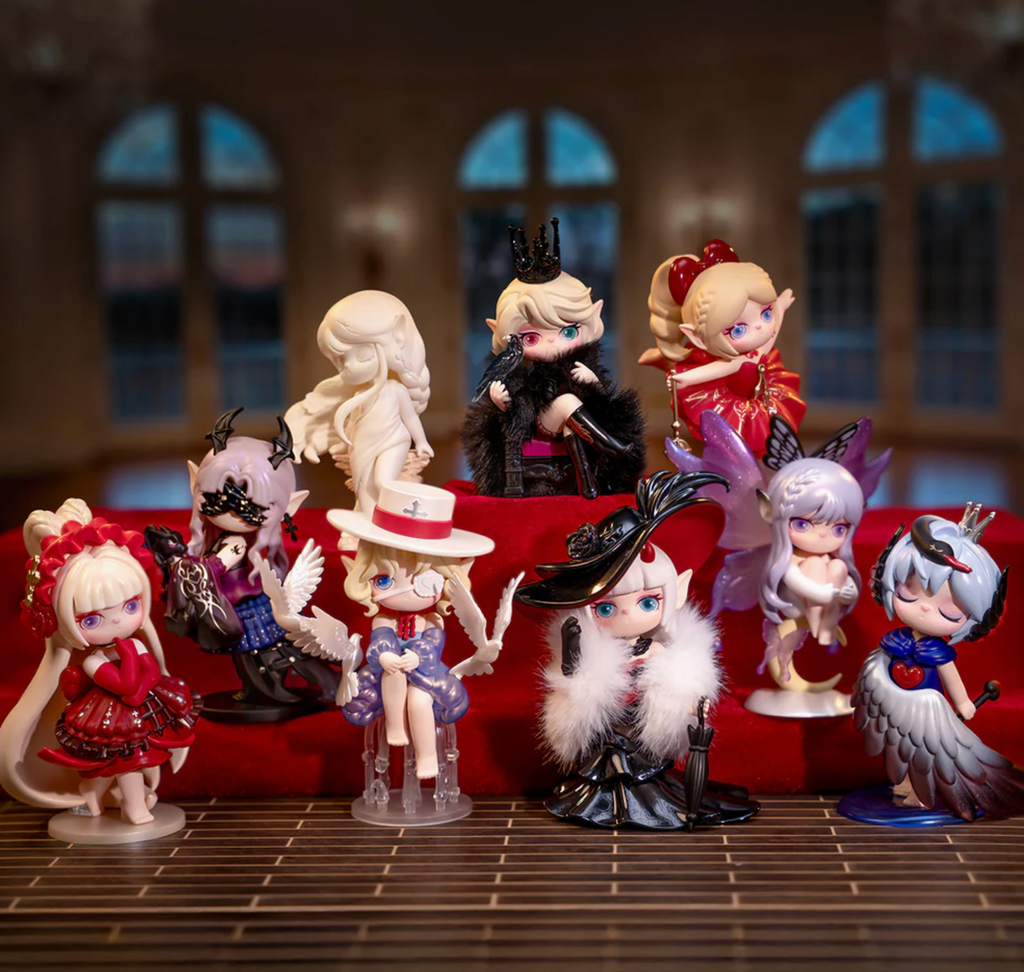 Collection of Suri Mystery Castle figurines set in a great room with big windows in the background. 