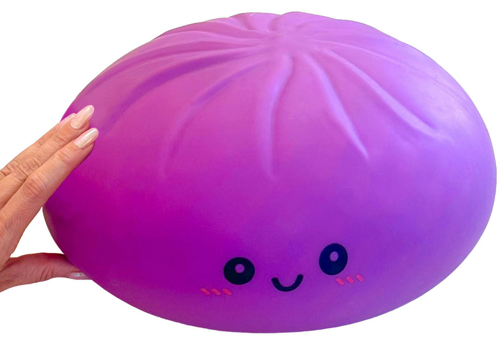 A close up picture of the dark purple Jumbo Squishy Dumplin' sensory toy. 