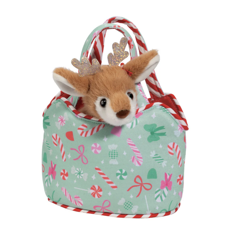 Little purse with a pattern full of candy canes, festive bows, and other holiday sweets with a sweet little plush deer peeking out. 