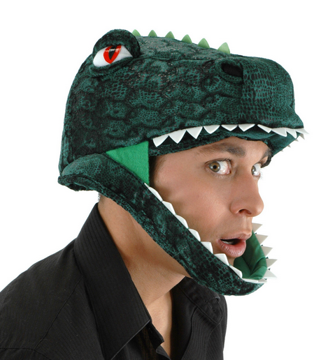 The Padded T-Rex Jawesome Costume Hat! It is adorned with felt spikes and teeth, giving it an authentic dinosaur look. The soft-sculpted eyes are red and angry. Shown here worn by an adult. 