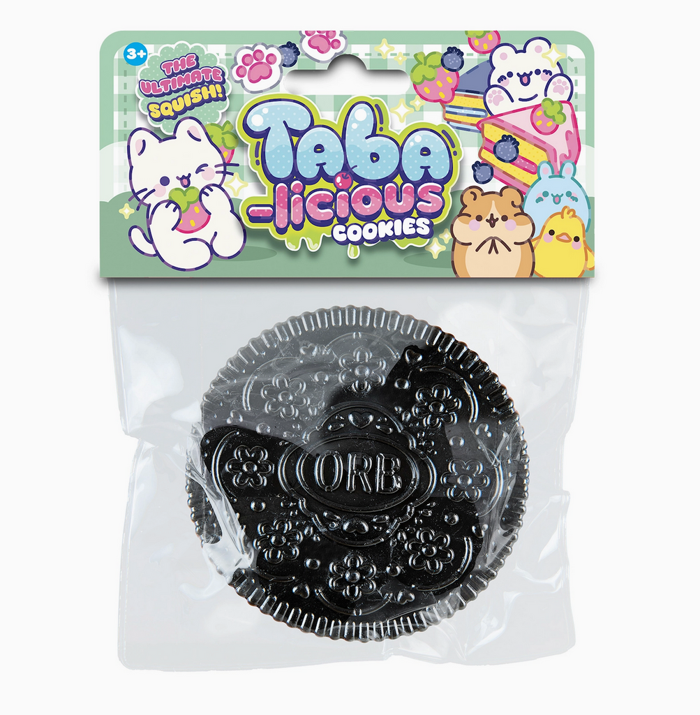 A black Taba-Licious Cookie packaged in a clear plastic bag with a colorfully illustrated header featuring cute kitties and other animals. 