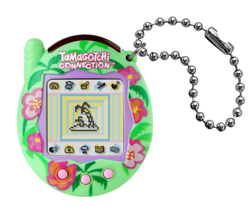 Tamagotchi Connection with vibrant green shell with pink and orange tropical flowers all over it. 