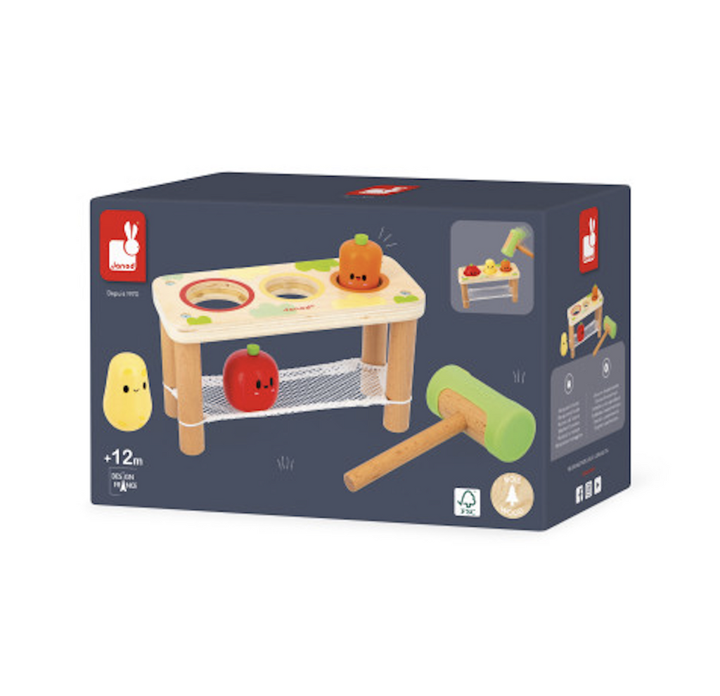 Blue box with colorful pictures of the wooden Tap Tap Vegetable pounding bench. 