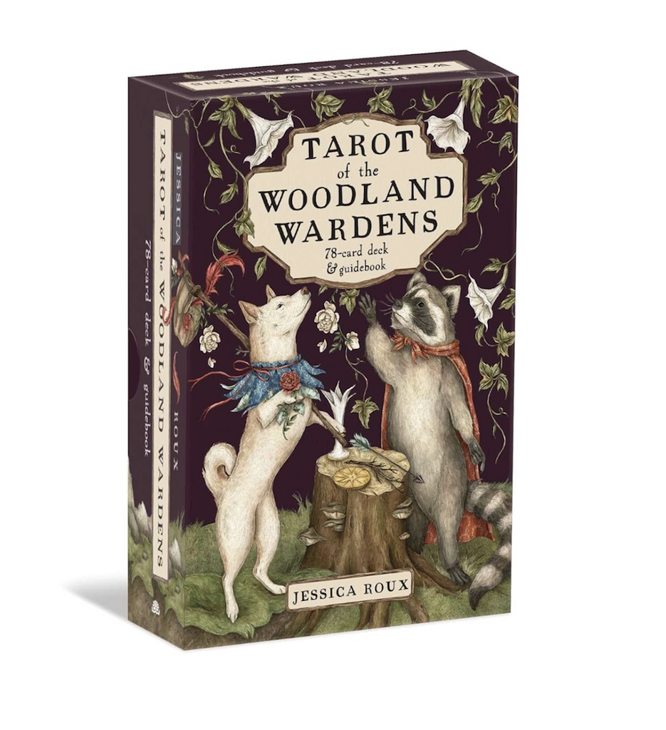 Tarot of the Woodland Wardens 78 card deck and guidebook packaged in a beautifully illustrated box featuring a dog and raccoon. 